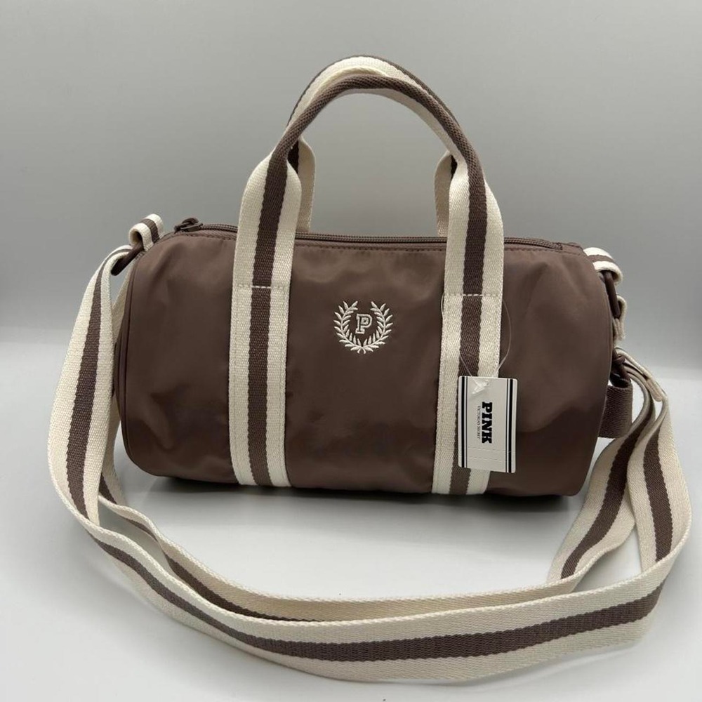 PINK by Victoria's Secret small brown duffle bag with white stripes.